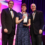 Ella Carlson accepts her award at the Grand Imaging Awards