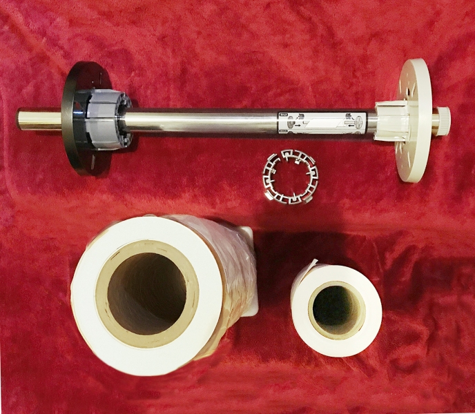 The roll spindle and 2-inch roll adapters ship with the P5000. Notice the 3-inch core diameter on the canvas on the left and the 2-inch core diameter canvas on the right.