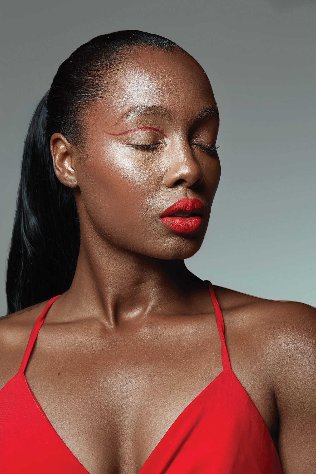 Woman wearing red top