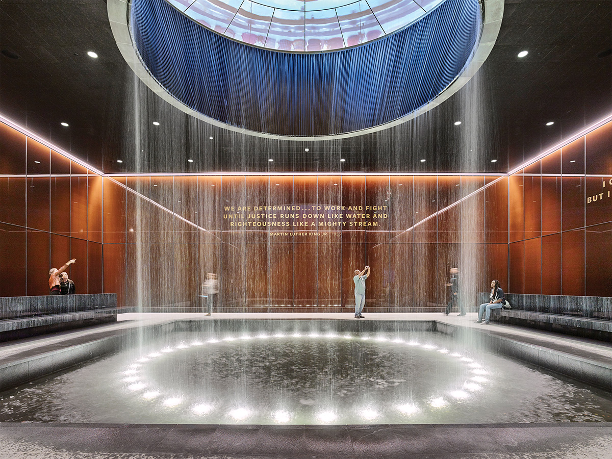Water fountain flows from the ceiling in the National Museum of African American History and Culture